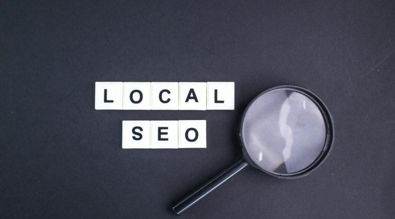 the importance of local seo for drug rehab centers, magnifying glass next to local seo blocks