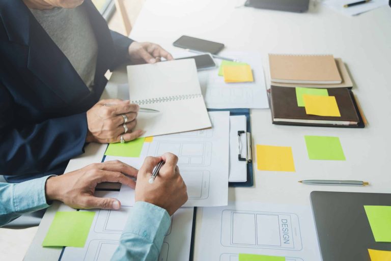 Web designer team working on UX design and SEO for addiction treatment center website