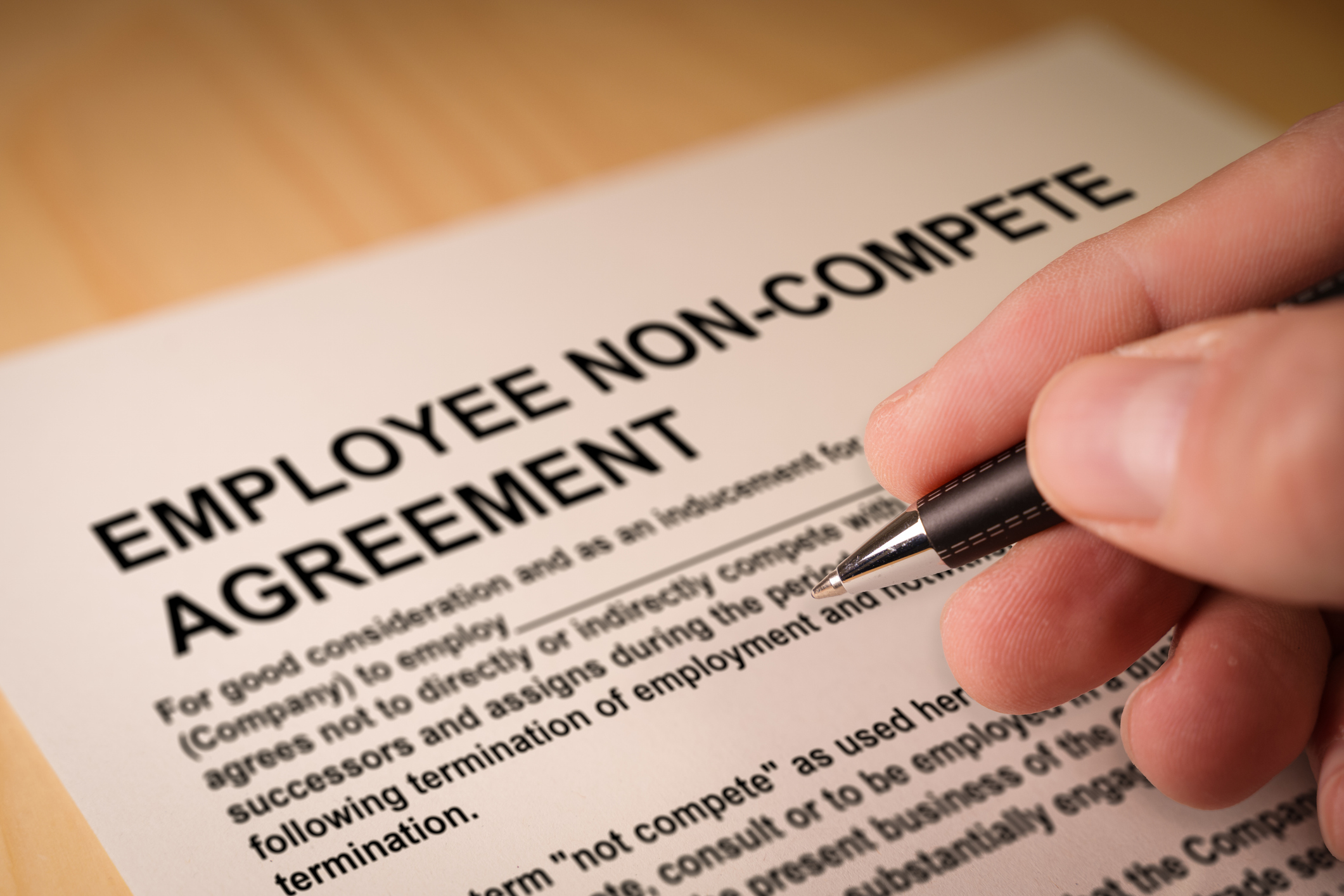 Non-compete agreement being signed
